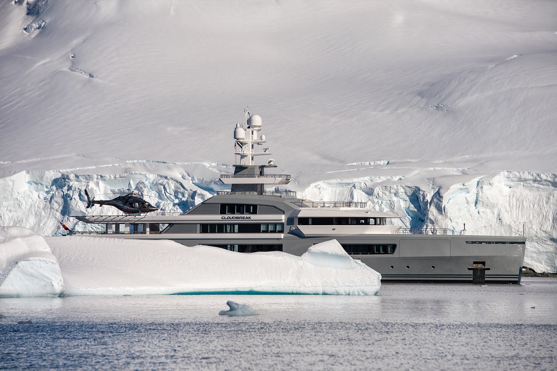 A yacht at the glacier’s edge.